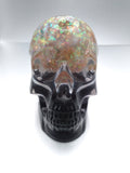 Black and iridescent skull