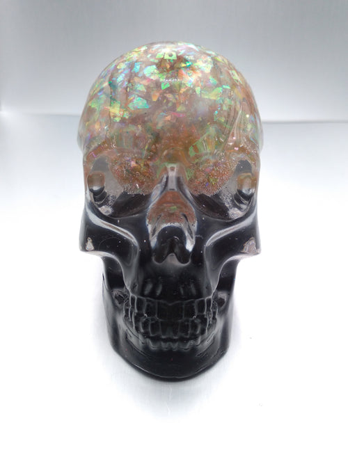 Black and iridescent skull
