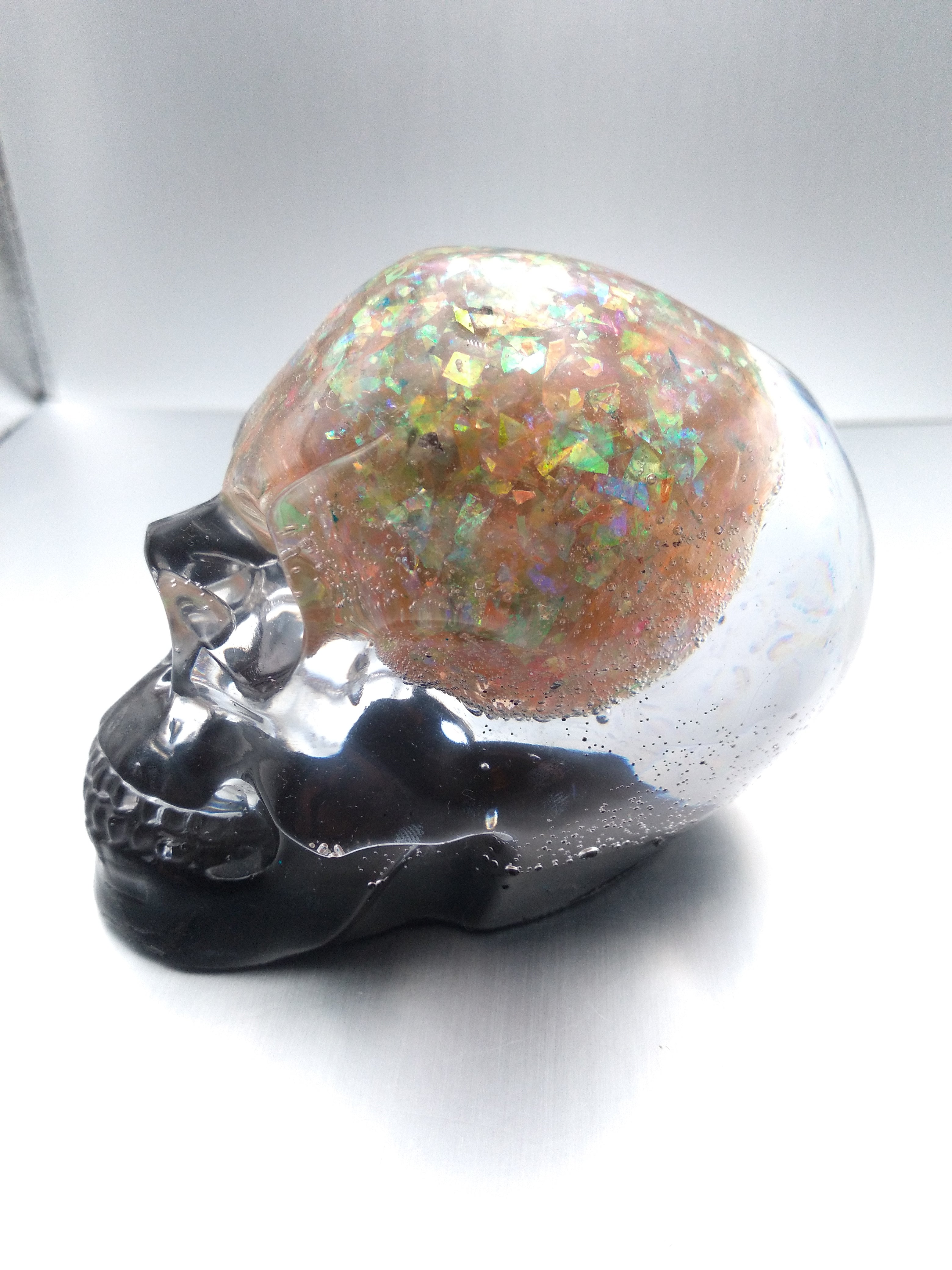 Black and iridescent skull