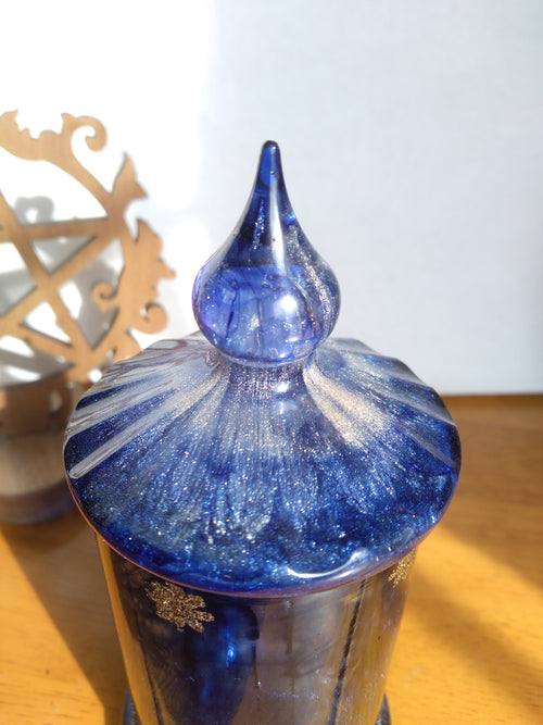 Dark blue swirled resin storage jar