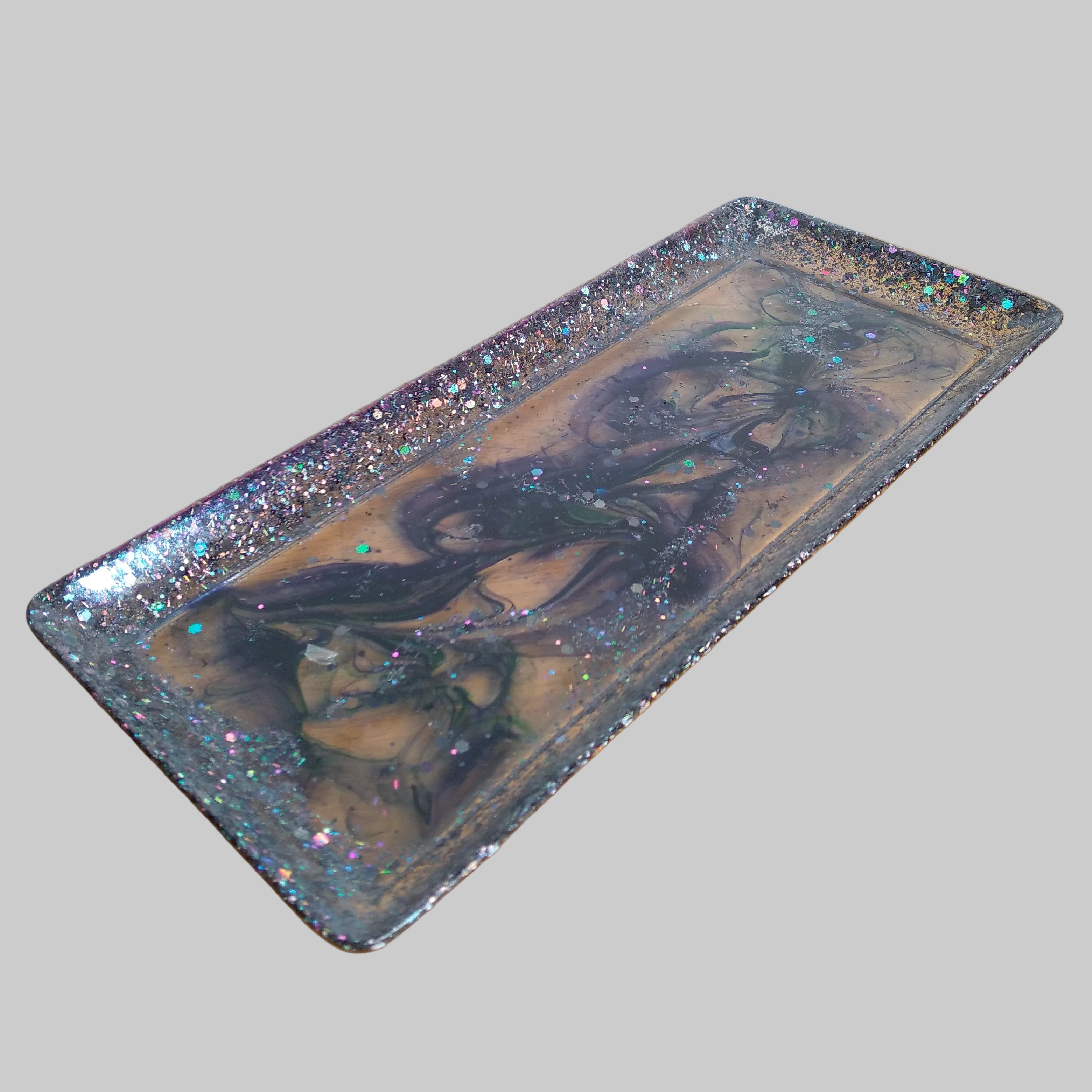 Decorative glitter and purple/green tray