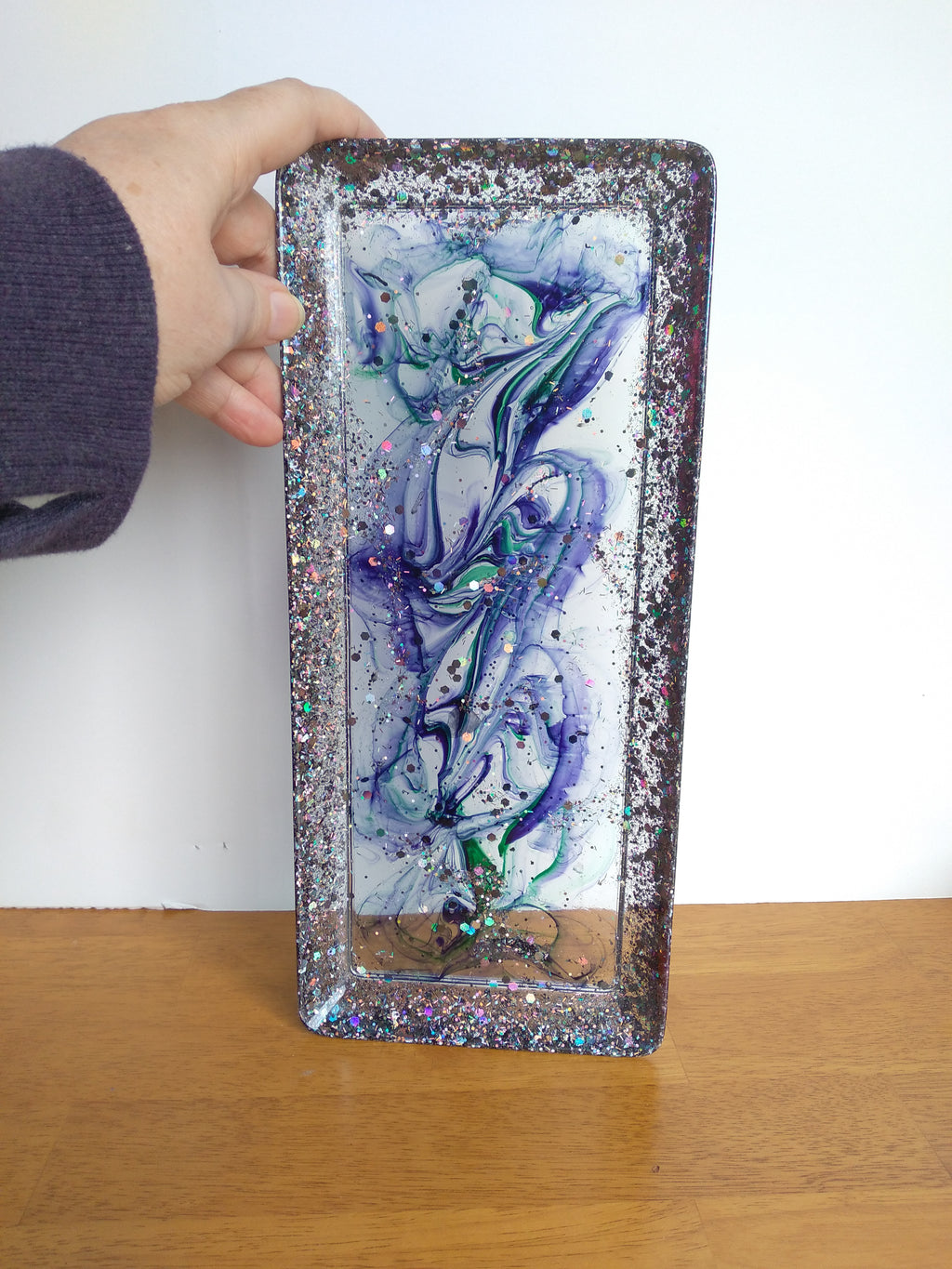 Decorative glitter and purple/green tray