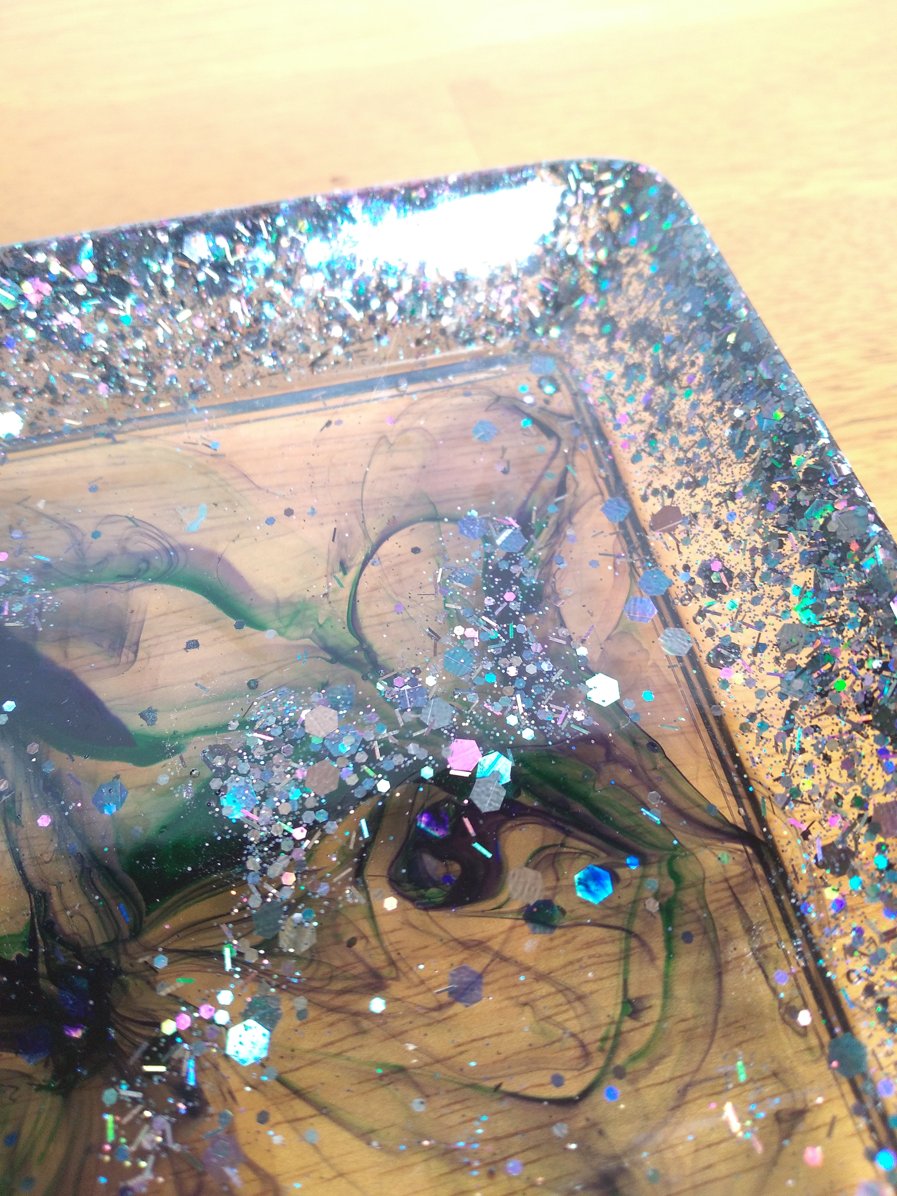 Decorative glitter and purple/green tray
