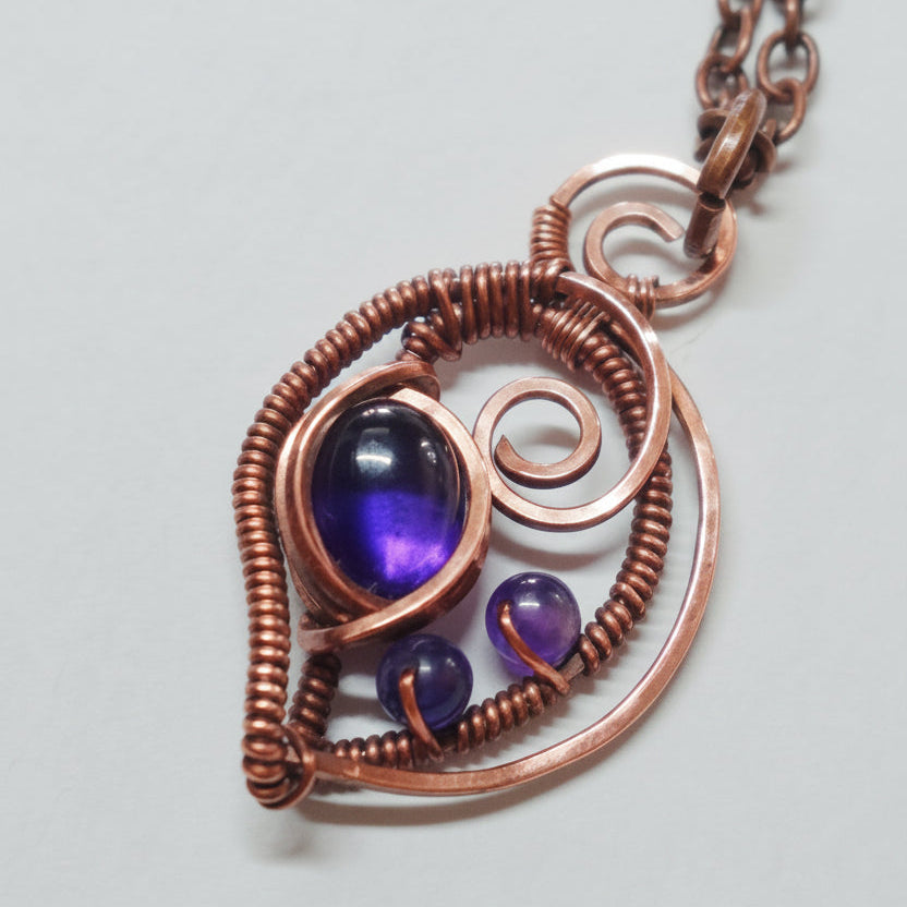 Amethyst and copper 3 stone pendant