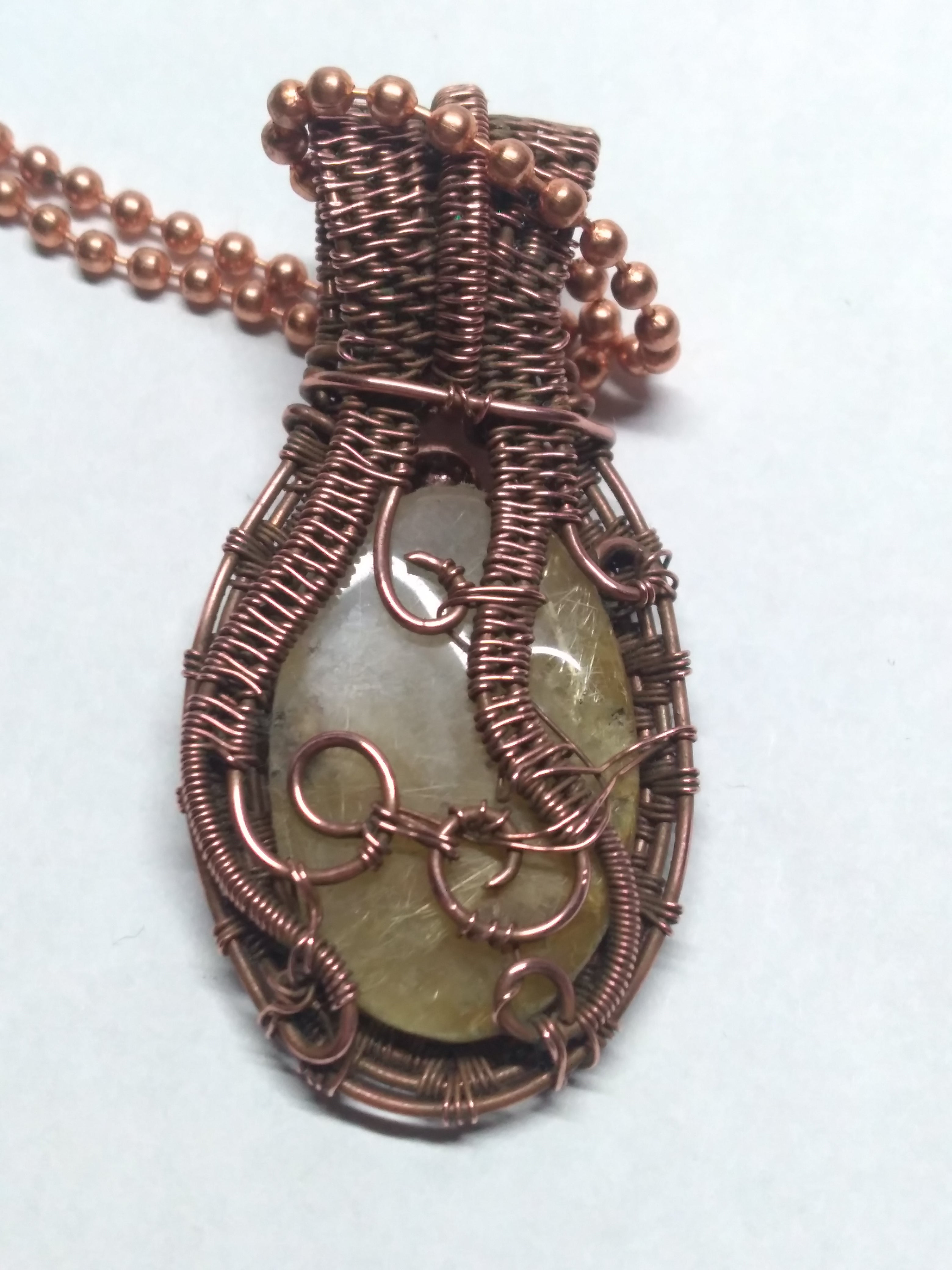 Golden rutile quartz and copper necklace pendant