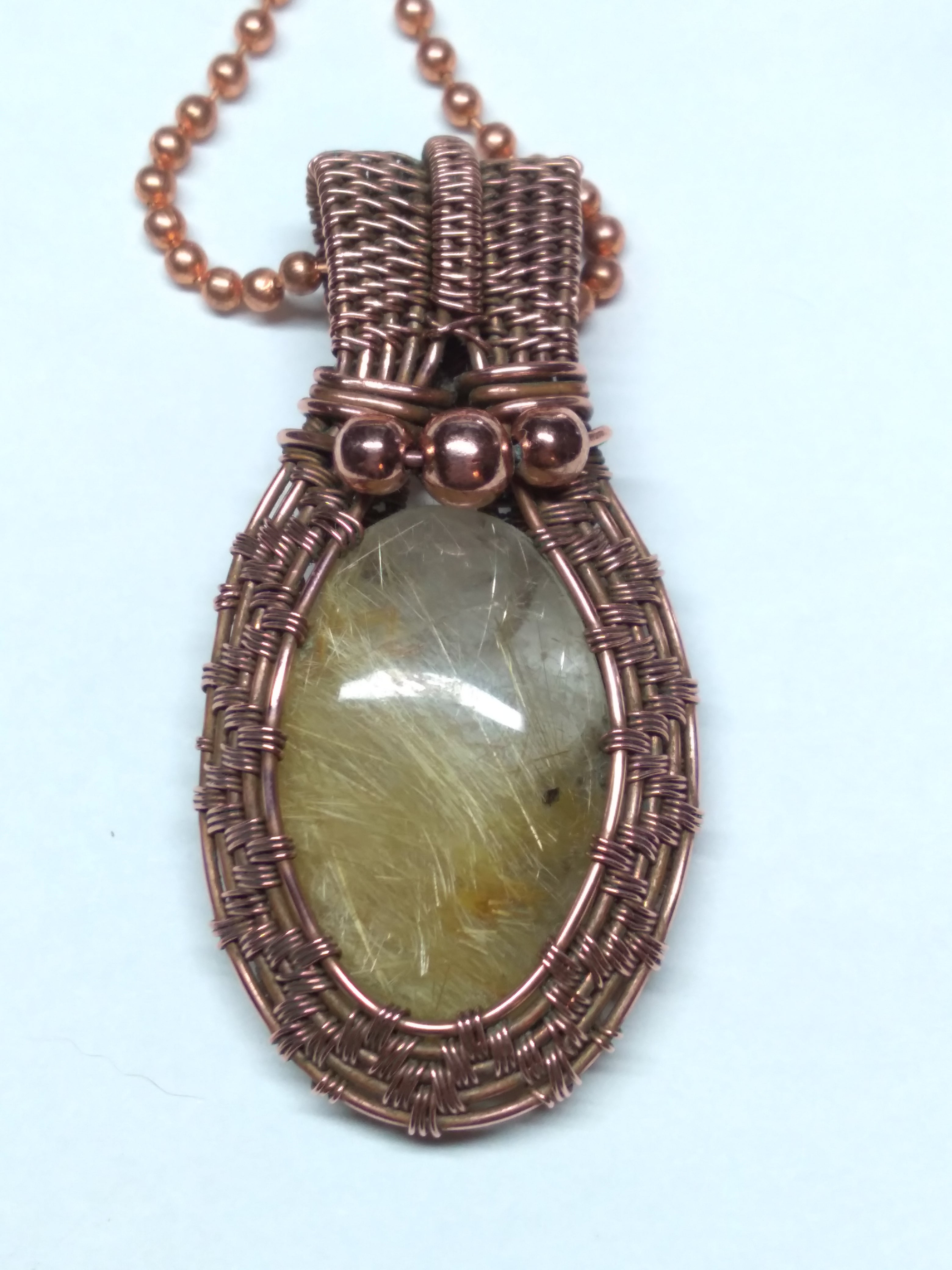 Golden rutile quartz and copper necklace pendant