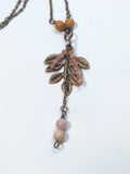 Sunstone and leaf pendant necklace bronze