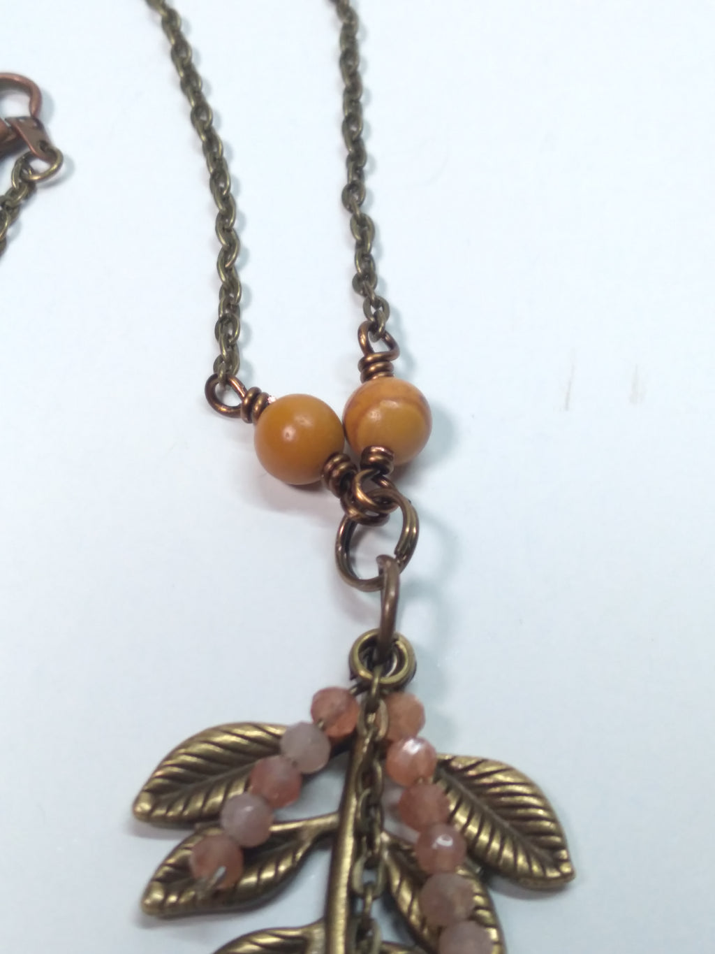 Sunstone and leaf pendant necklace bronze
